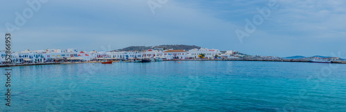 View of the famous pictorial narrow streets of Mykonos town in Mykonos island, full of colors and people. next to Little Venice and its Windmills. 