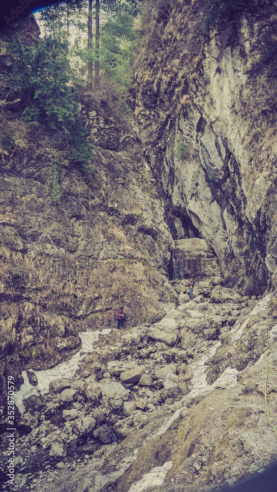 A portrait of people climb on rocks