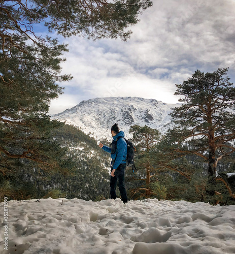 alpinist and mountain landscape