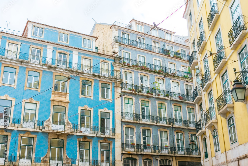 Fototapeta premium Old Town Lisbon. street view of typical houses in Lisbon, Portugal, Europe