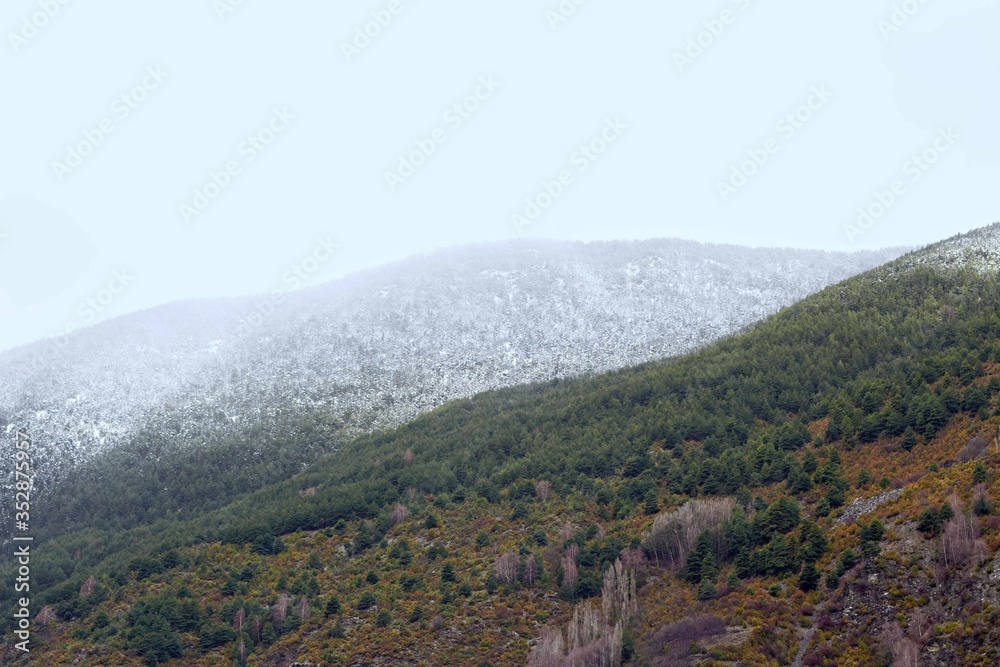 Obraz premium View of a mountain while snowing in Andorra