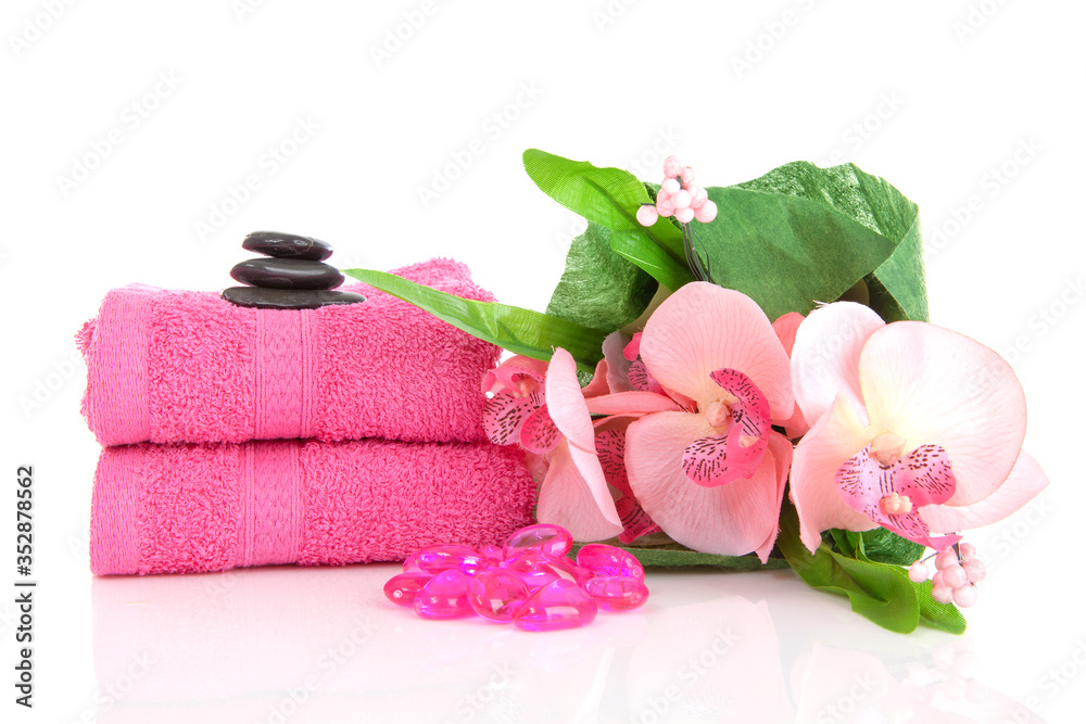 Pink towels and spa objects