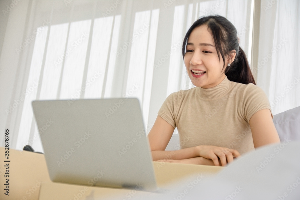 Women Freelancer working from home and using laptop computer Women Freelancer working from home and using laptop computer