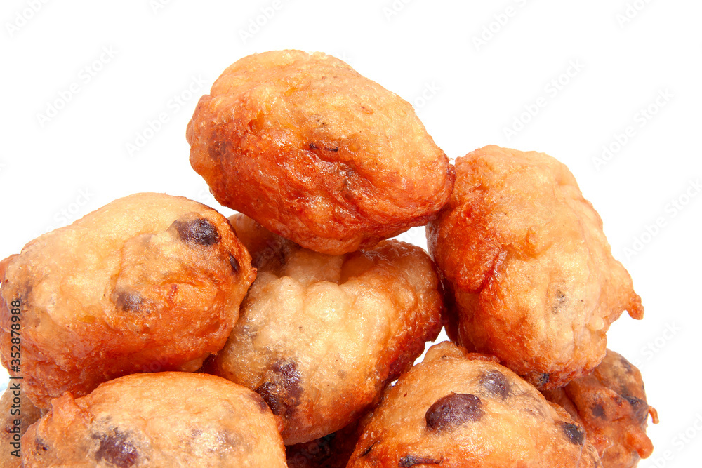 Deep fried doughnut balls also known as typical Dutch oliebollen Deep fried doughnut balls also known as typical Dutch oliebollen