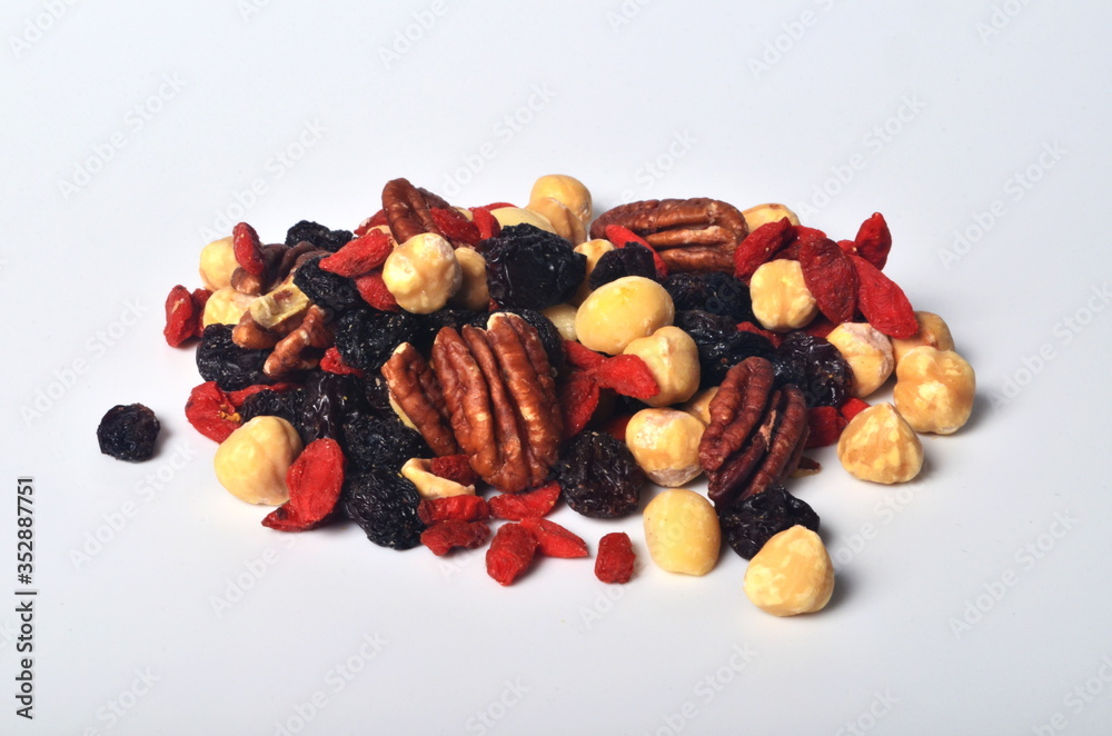 Nut and dried berries mix stack isolated on white background Nut and dried berries mix stack isolated on white background