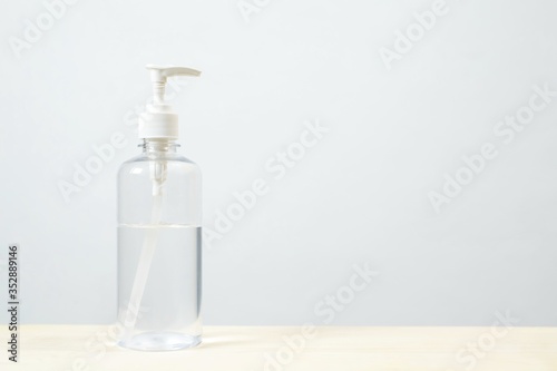 Bottle of hand sanitizer alcohol gel clear liquid plastic pump. antiseptic prevent the spread of germ and bacteria antibacterial hygiene and avoid infection corona virus, covid 19 protection.