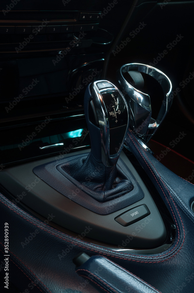 Automatic car transmission. Interior detail. Vertical photo.