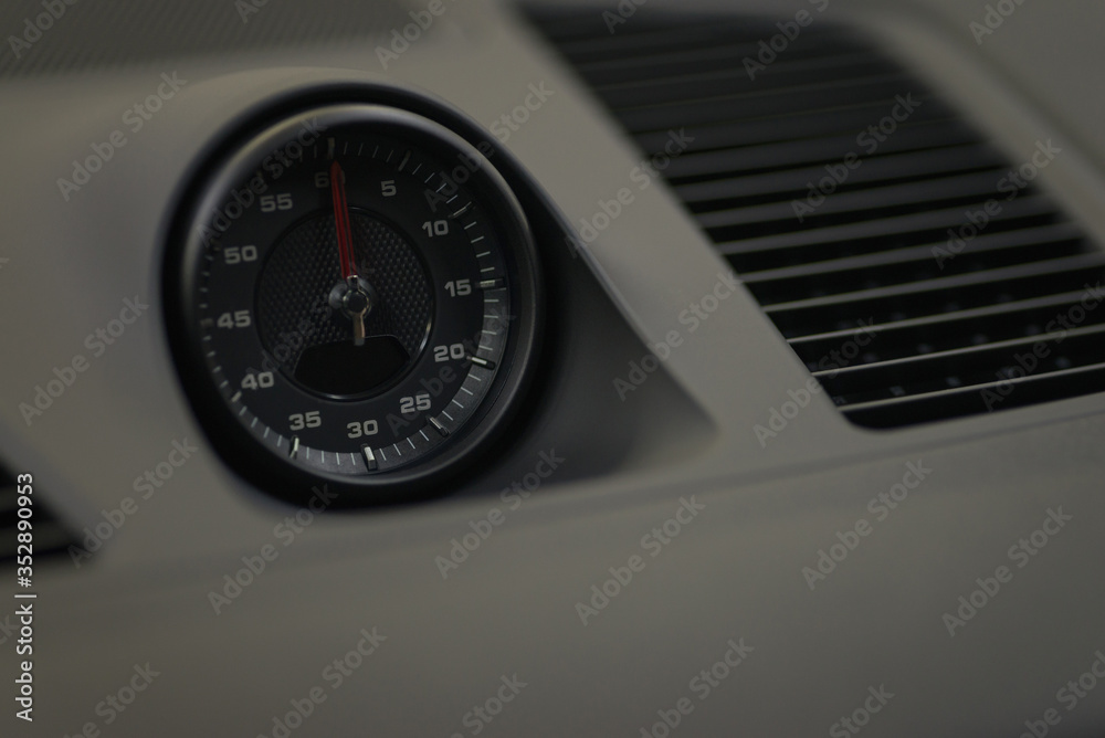 Dashboard stopwatch in sport car. Interior detail. Transportation background. Dashboard stopwatch in sport car. Interior detail. Transportation background.