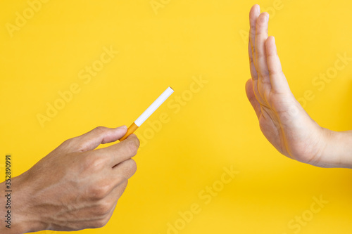 World No Tobacco Day, May 31. Just Say No To Stop Smoking. Close Up Man Hand Reject Cigarette Offer