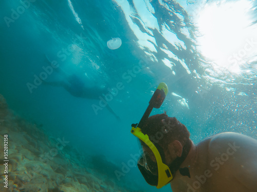 man with snorkeling mask underwater summer sea vacation
