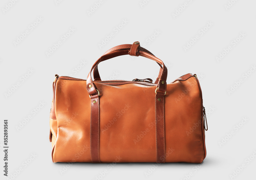 Large classic brown leather travel bag Stock Photo | Adobe Stock