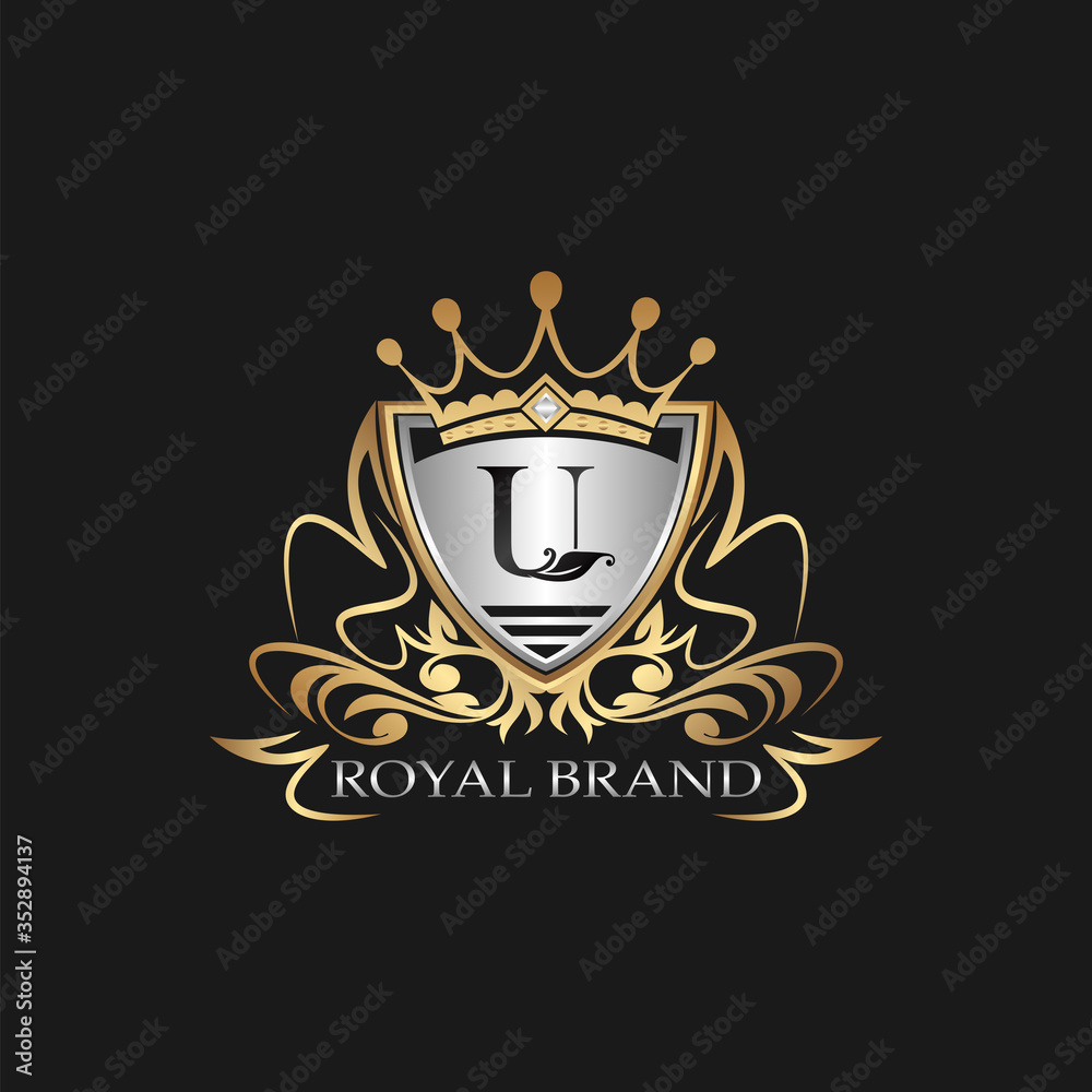 U Letter Gold Shield Logo. Elegant vector logo badge template with alphabet letter on shield frame ornate vector style design. U Letter Gold Shield Logo. Elegant vector logo badge template with alphabet letter on shield frame ornate vector style design.