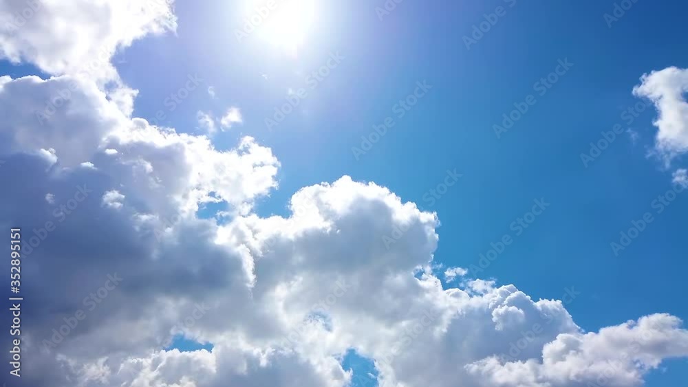 Building motions clouds. Puffy fluffy white clouds sky time lapse. slow moving clouds. B Roll Footage Cloudscape timelapse cloudy. footage timelapse nature. background worship christian concept.