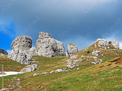 Natural stone sculptures of Chilchstein under the alpine peak of Matthorn in the Pilatus mountain range, Alpnach - Canton of Obwalden, Switzerland (Kanton Obwalden, Schweiz) photo