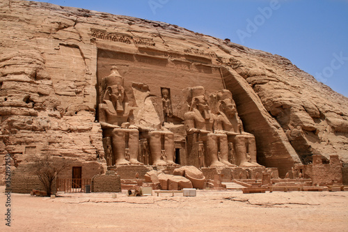 figures carved in to the entrance of an Egyptian Temple