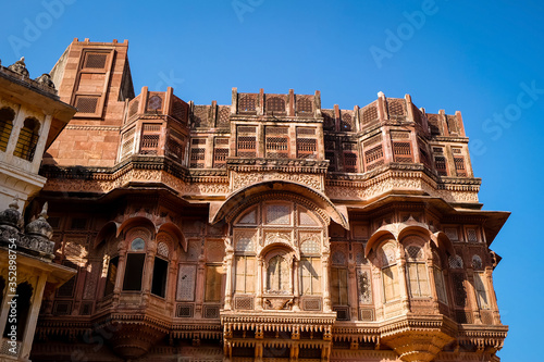 Beautiful details carved facade wall and windows exterior architecture in Mehrangarh fort at Jodhpur Rajasthan, India. Mehrangrah Fort is a UNESCO world Heritage site.