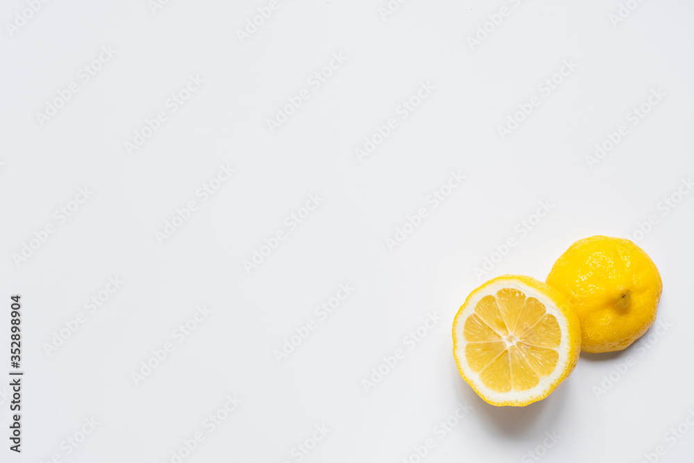 top view of fresh cut lemon on white background top view of fresh cut lemon on white background