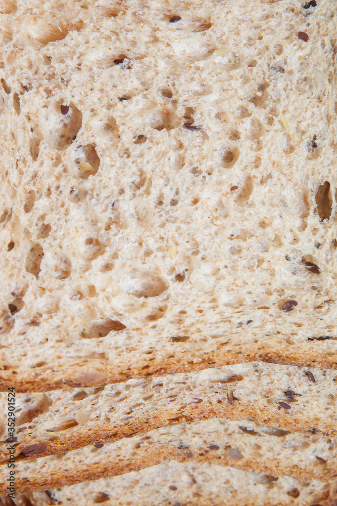 Slices of brown bread in a stack and close up