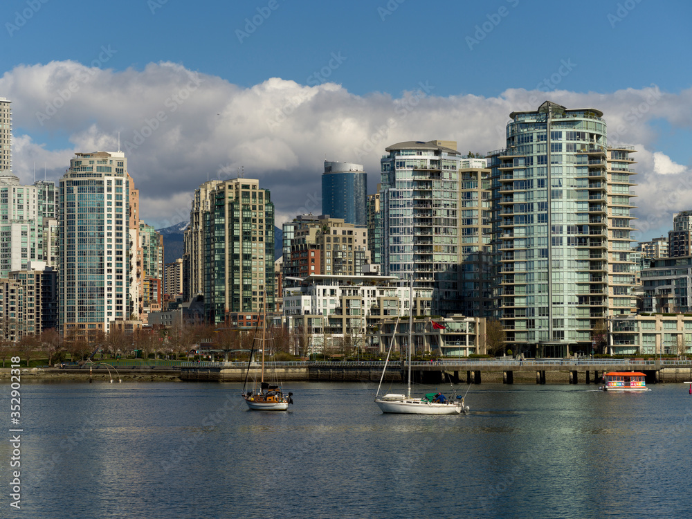 Boats on False Creek with skyscrapers in the background, Vancouver, Lower Mainland, British Columbia, Canada Boats on False Creek with skyscrapers in the background, Vancouver, Lower Mainland, British Columbia, Canada