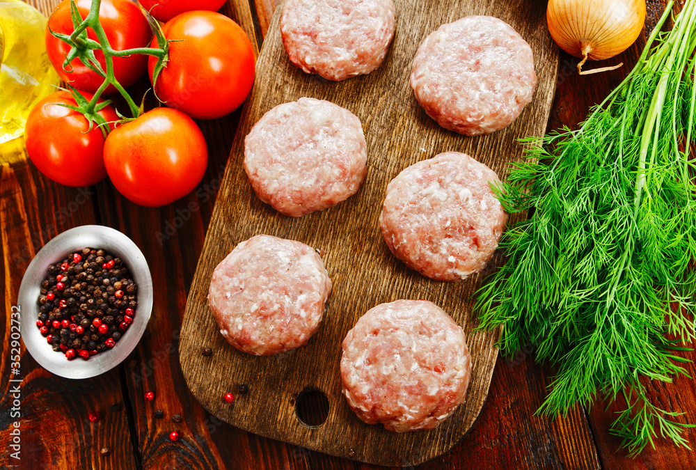Raw meatballs on the table Raw meatballs on the table