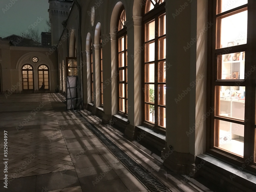 Light from the arched windows in a church.