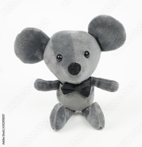 Rat doll on wire background