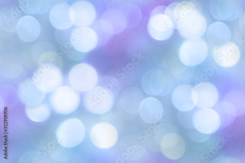 Light abstract blurry blue bokeh background.