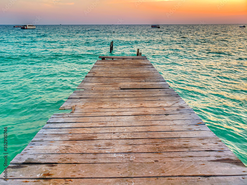 Fototapeta premium Beautiful pier at sunset in a paradise island in Cambodia