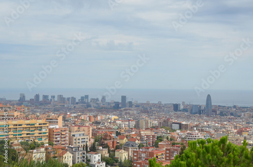 City View from park Guell with barcelona city skyline. Barcelona  the cosmopolitan capital of Spain   s Catalonia region  is known for its art and architecture. 