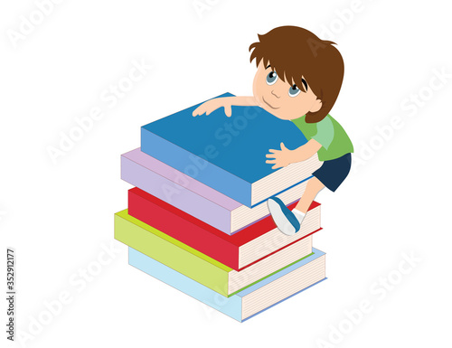 A child (boy) is parking up the books. School, education, science.