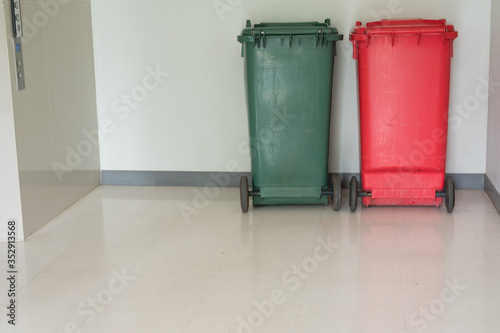 Green and red garbage bin in the hospital.Infection and general trash in the dental clinic.Infectious control concept.