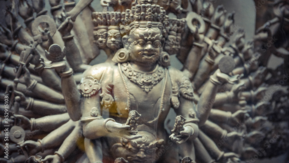 A close up of person with hands sculpture