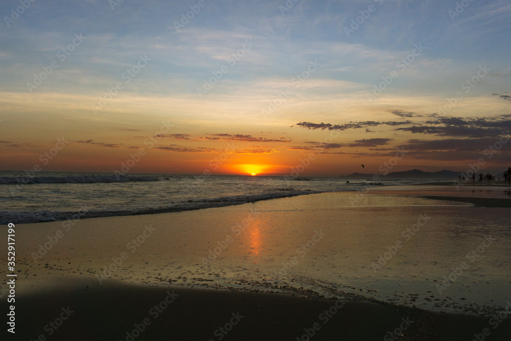 Summer sunset over the ocean. Rio de Janeiro, Brazil Summer sunset over the ocean. Rio de Janeiro, Brazil