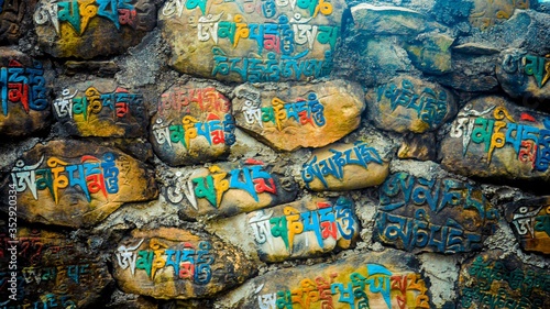 Close up of rocks with colourful words