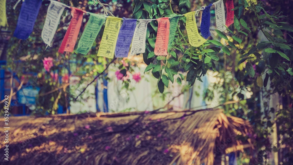 Colourful flags hanging with written words on it Colourful flags hanging with written words on it