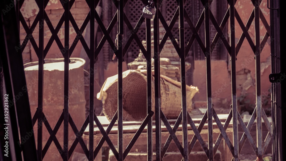 Damaged woven basket at the outside the grill