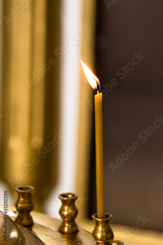 burning candles in a church