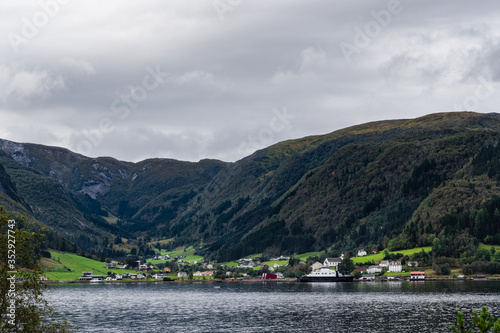 Wallpaper Mural Fjord view with a car ferry in port in a valley on a late summer day, Norway Torontodigital.ca