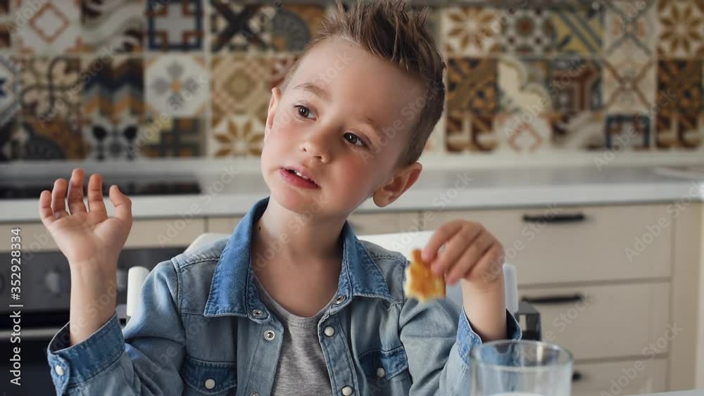 Little kid eating home made cookies