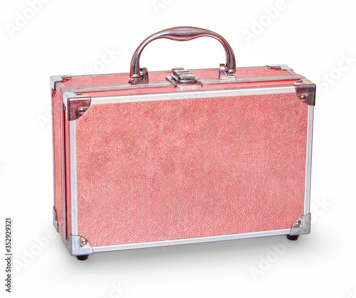 Children's modern stylish suitcase. Beautiful shiny children's briefcase - a toy. A small pink suitcase for little girls to play with. Isolated on white background with. With clipping  path. photo