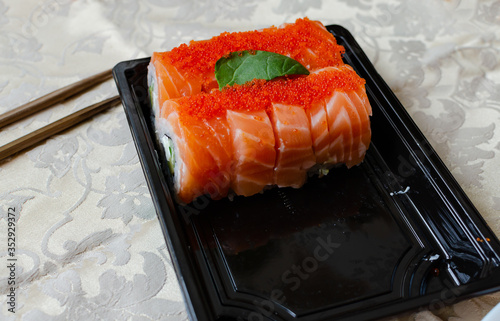 rolls and sushi on a light background, tasty food at home