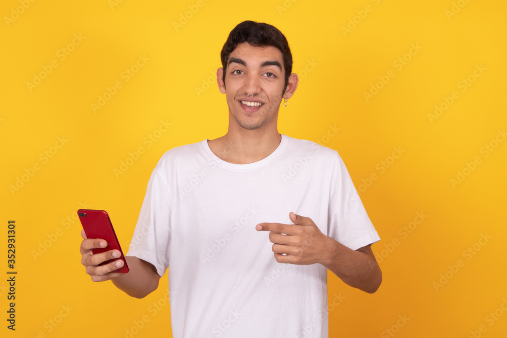 young male teenager isolated on color background young male teenager isolated on color background