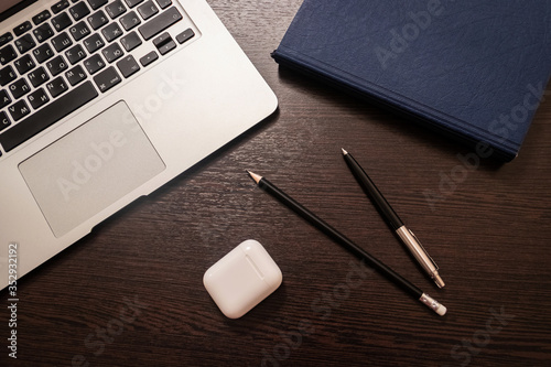 Notebook, pen, pencil and notebook on the table. Remote work.