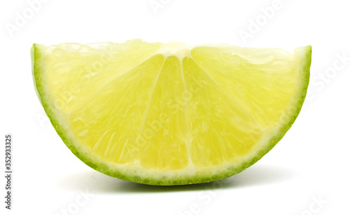 on piece of lime on white background