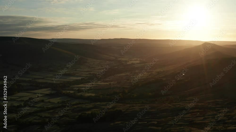 Scottish countryside dawn aerial view with mountain peaks and farmland Scottish countryside dawn aerial view with mountain peaks and farmland