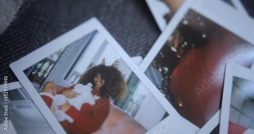 Background of Christmas photos of black woman wearing red sweater photo