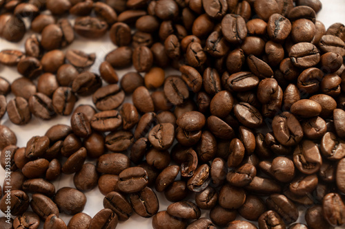 coffee beans a lot of coffee scattered on a white background