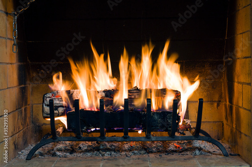 Closeup of firewood burning in fire. Fire in fireplace  firewood burns in a fireplace.