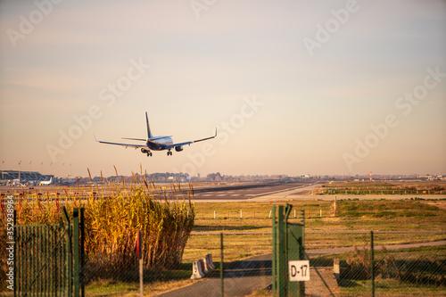 BARCELONA, CATALUNYA, SPAIN - DECEMBER 13, 2017: Ryanair company plane landing at El Prat airport, Barcelona.