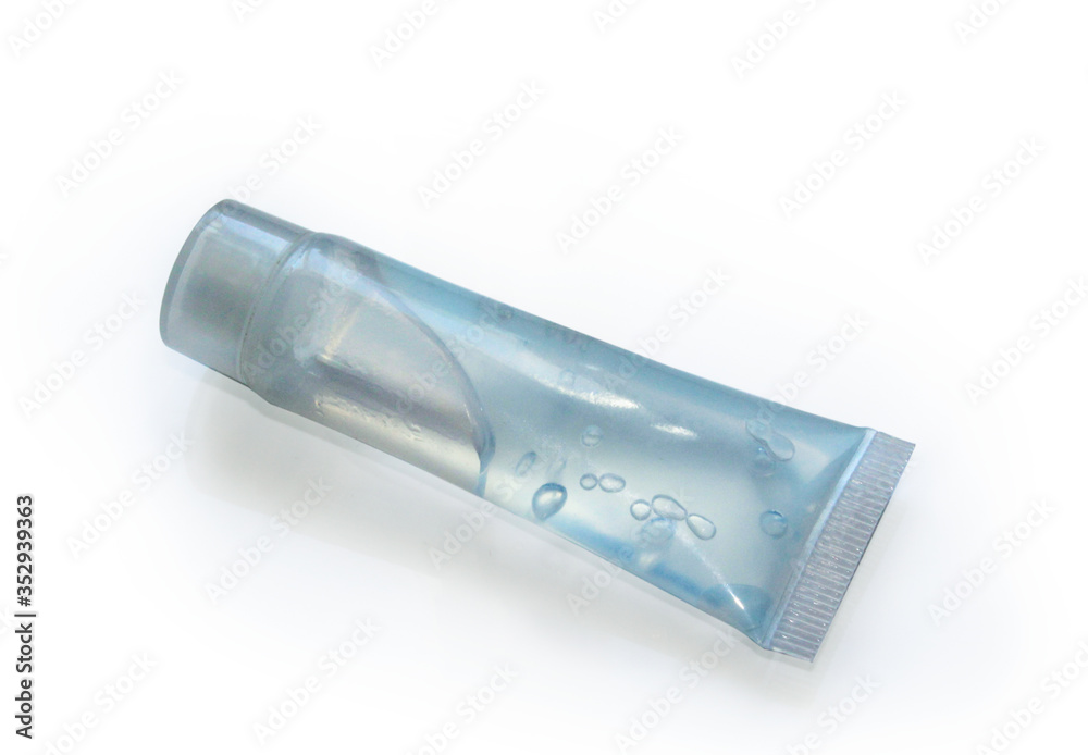 Plastic translucent blue gel tube isolated on white background. Plastic translucent blue gel tube isolated on white background.